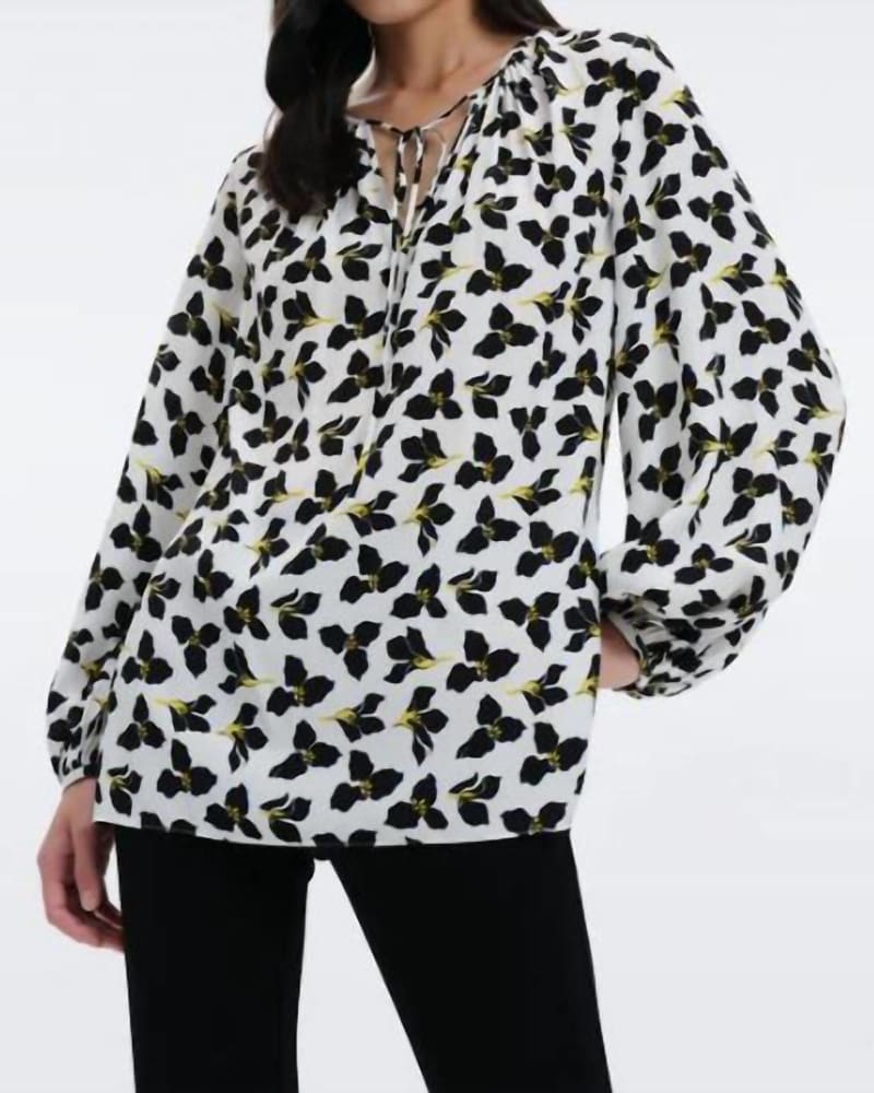 Front of a model wearing a size L Freddie Blouse in Graphic Flower Ivory in Graphic Flower Ivory by Diane von Furstenberg. | dia_product_style_image_id:334239